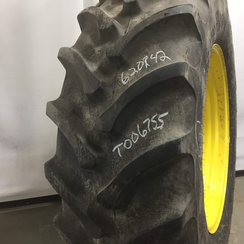 620/70R42 Firestone Radial All Traction DT R-1W on John Deere Yellow 12-Hole Stub Disc 75%