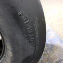 31x13.50-15 Titan Farm Flo-Trac Rib HF-1 C (6 Ply), 99%