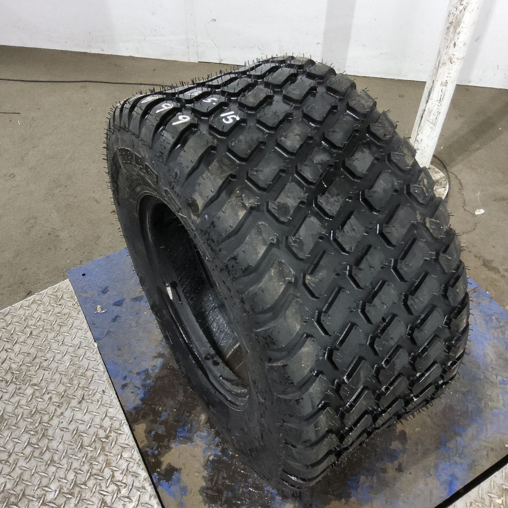 31x13.50-15NHS Titan Farm Multi Trac C/S HF-1 F (12 Ply), 99%