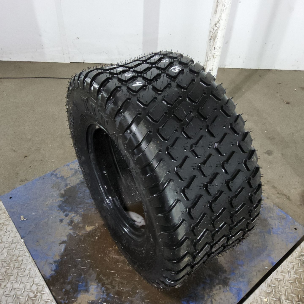 31x13.50-15NHS Titan Farm Multi Trac C/S HF-1 F (12 Ply), 99%
