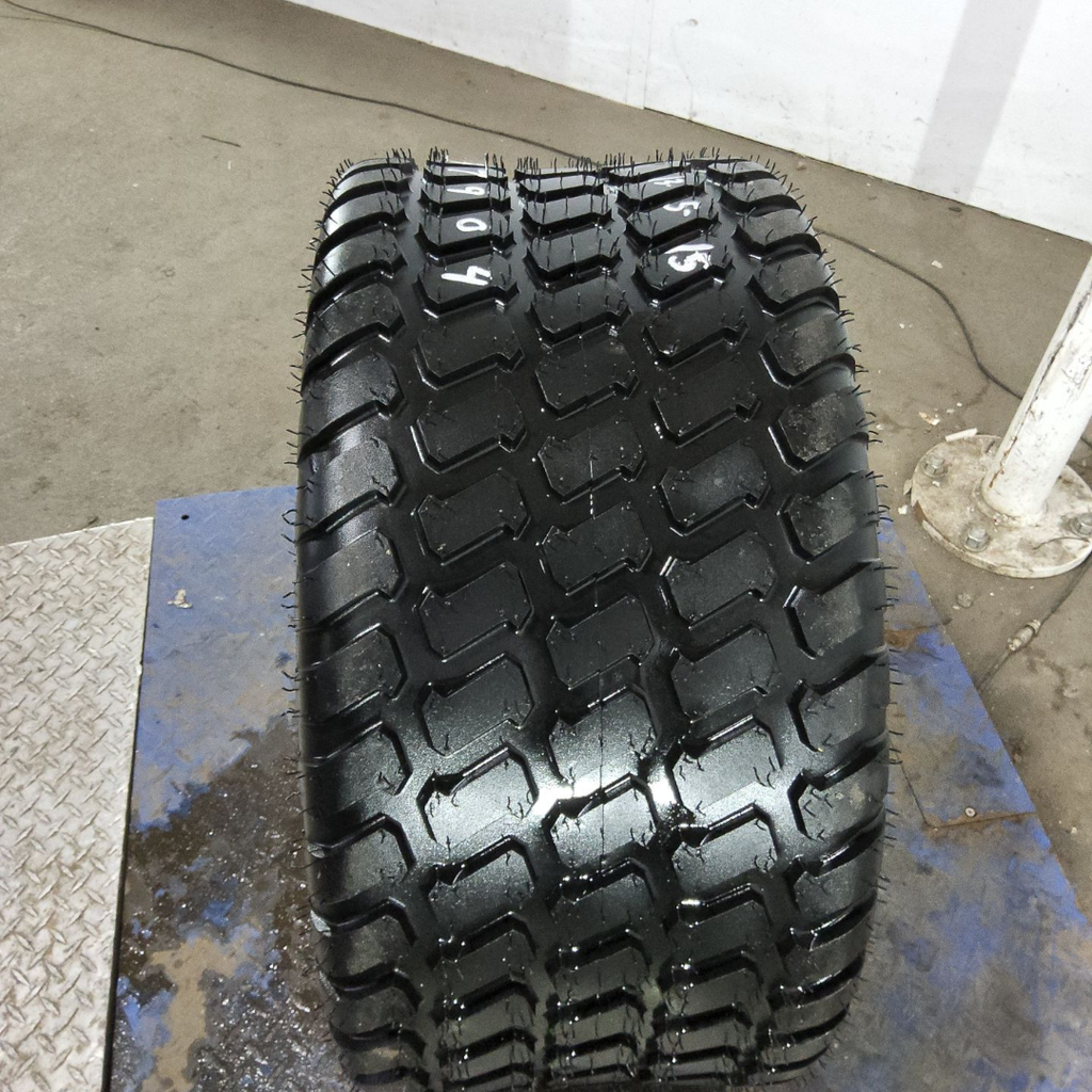 31x13.50-15NHS Titan Farm Multi Trac C/S HF-1 F (12 Ply), 99%
