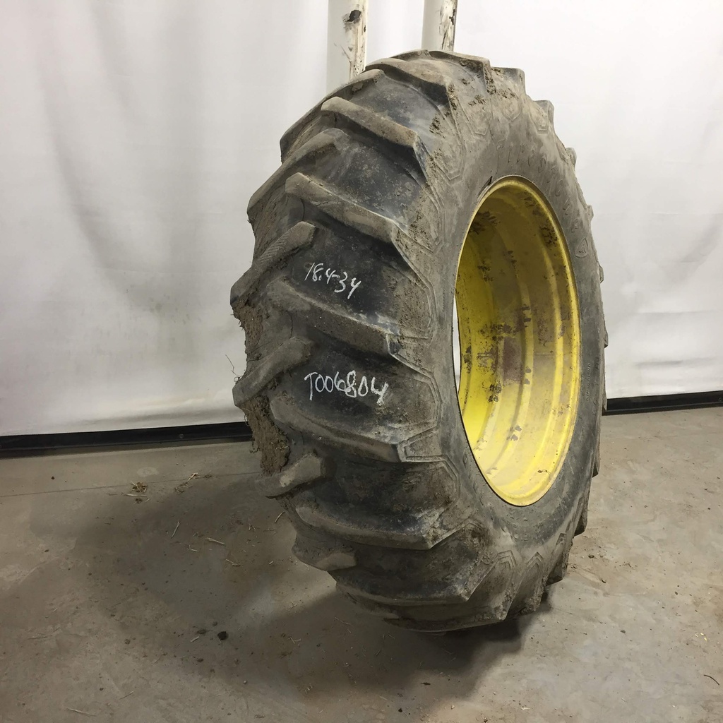 18.4/-34 Firestone Traction Field & Road R-1 on John Deere Yellow 0-Hole Double Bevel Ag 35%