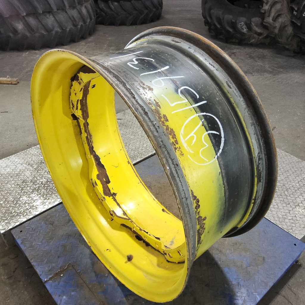 15"W x 34"D, John Deere Yellow 12-Hole Waffle Wheel (Groups of 3 bolts)