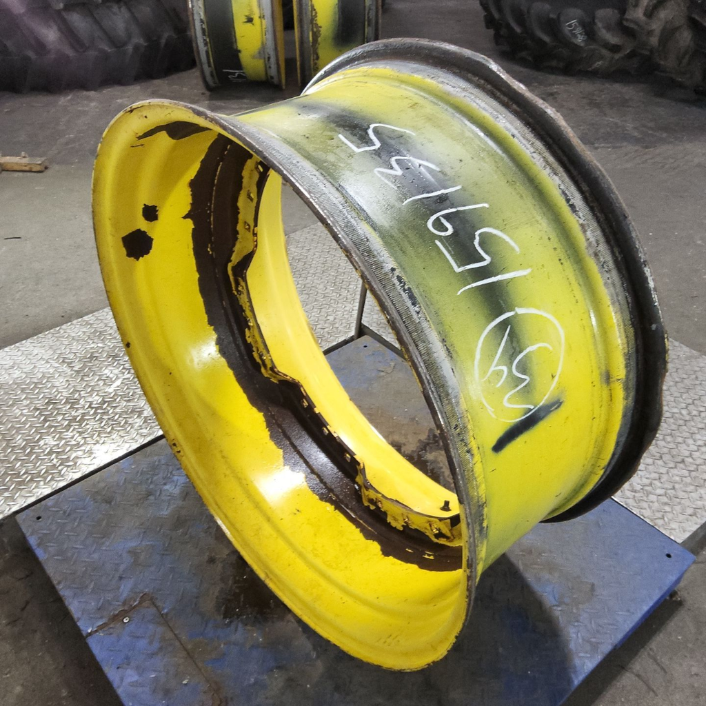 15"W x 34"D, John Deere Yellow 12-Hole Waffle Wheel (Groups of 3 bolts)
