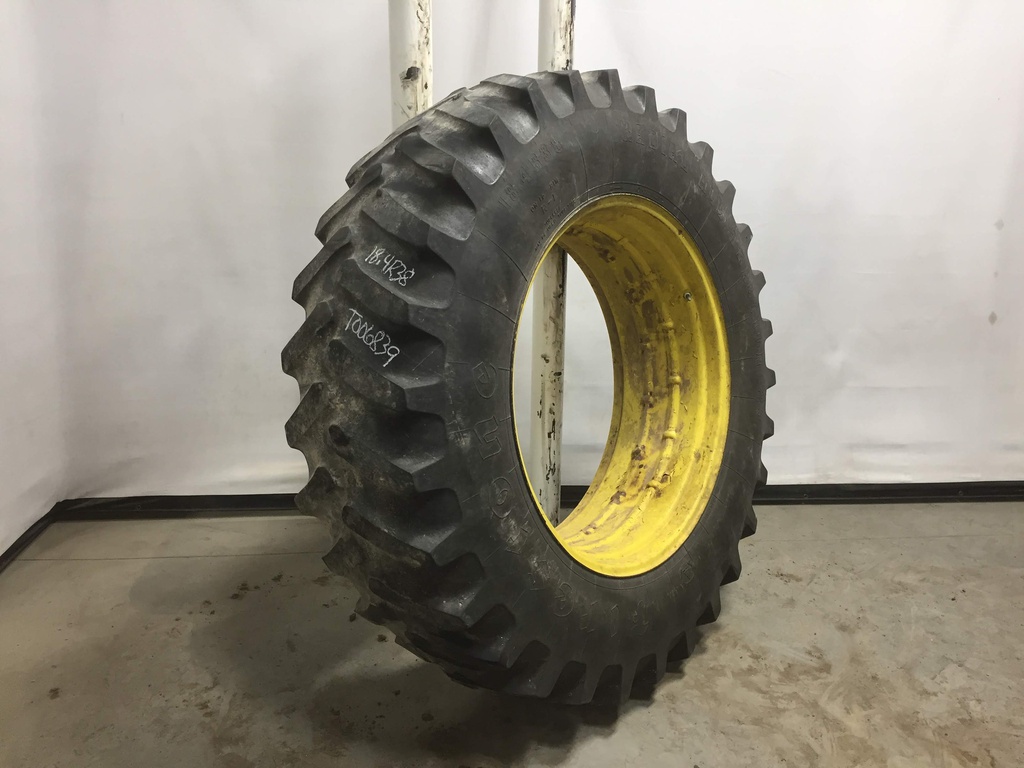 18.4/R38 Firestone Radial All Traction 23 R-1 on John Deere Yellow 0-Hole Double Bevel 38" Cast 35%