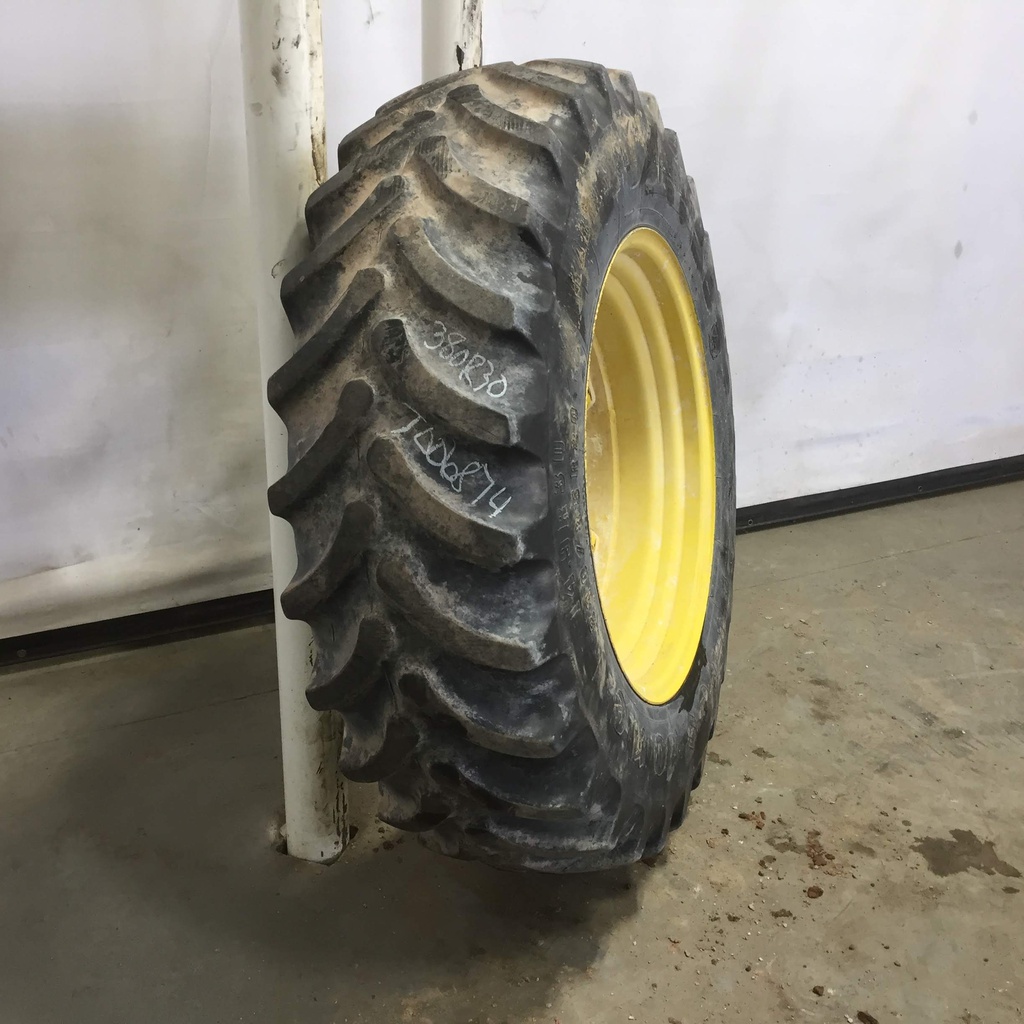 380/85R30 Firestone Radial All Traction FWD R-1 on John Deere Yellow 12-Hole Waffle Wheel (Groups of 3 bolts) 55%