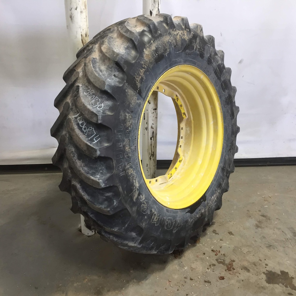 380/85R30 Firestone Radial All Traction FWD R-1 on John Deere Yellow 12-Hole Waffle Wheel (Groups of 3 bolts) 55%