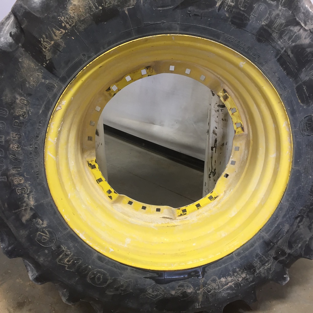 380/85R30 Firestone Radial All Traction FWD R-1 on John Deere Yellow 12-Hole Waffle Wheel (Groups of 3 bolts) 55%