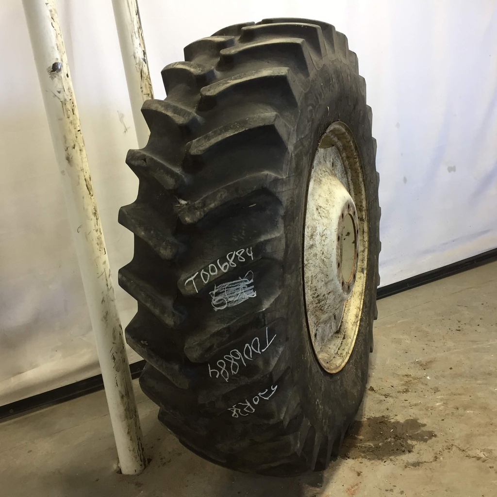 520/85R38 Firestone Radial All Traction 23 R-1 on New Holland White 10-Hole Formed Plate W/Weight Holes 80%