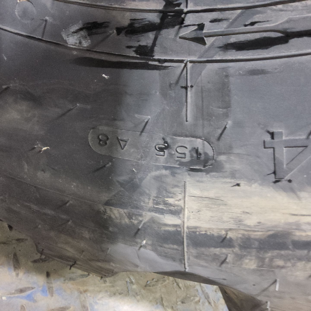 21L-24 Firestone All Traction Utility R-4 F (12 Ply), 99%