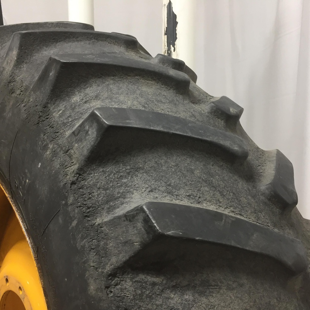 520/85R42 Firestone Radial All Traction 23 R-1 on Hagie Orange 10-Hole Formed Plate Sprayer 55%