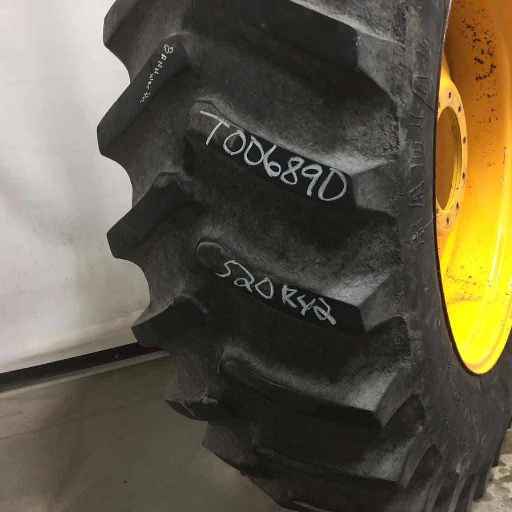 520/85R42 Firestone Radial All Traction 23 R-1 on Hagie Orange 10-Hole Formed Plate Sprayer 55%