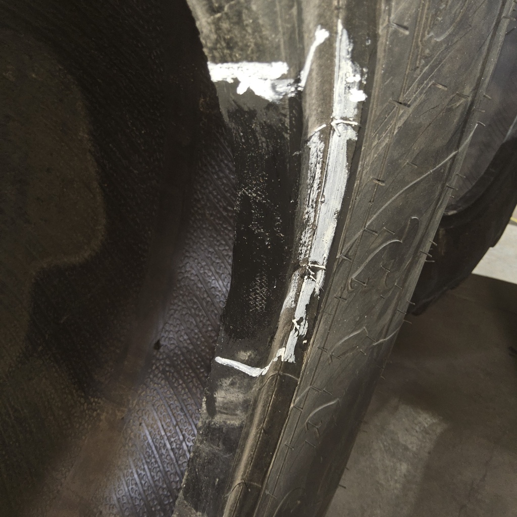 21L-24 Firestone All Traction Utility R-4 F (12 Ply), 99%