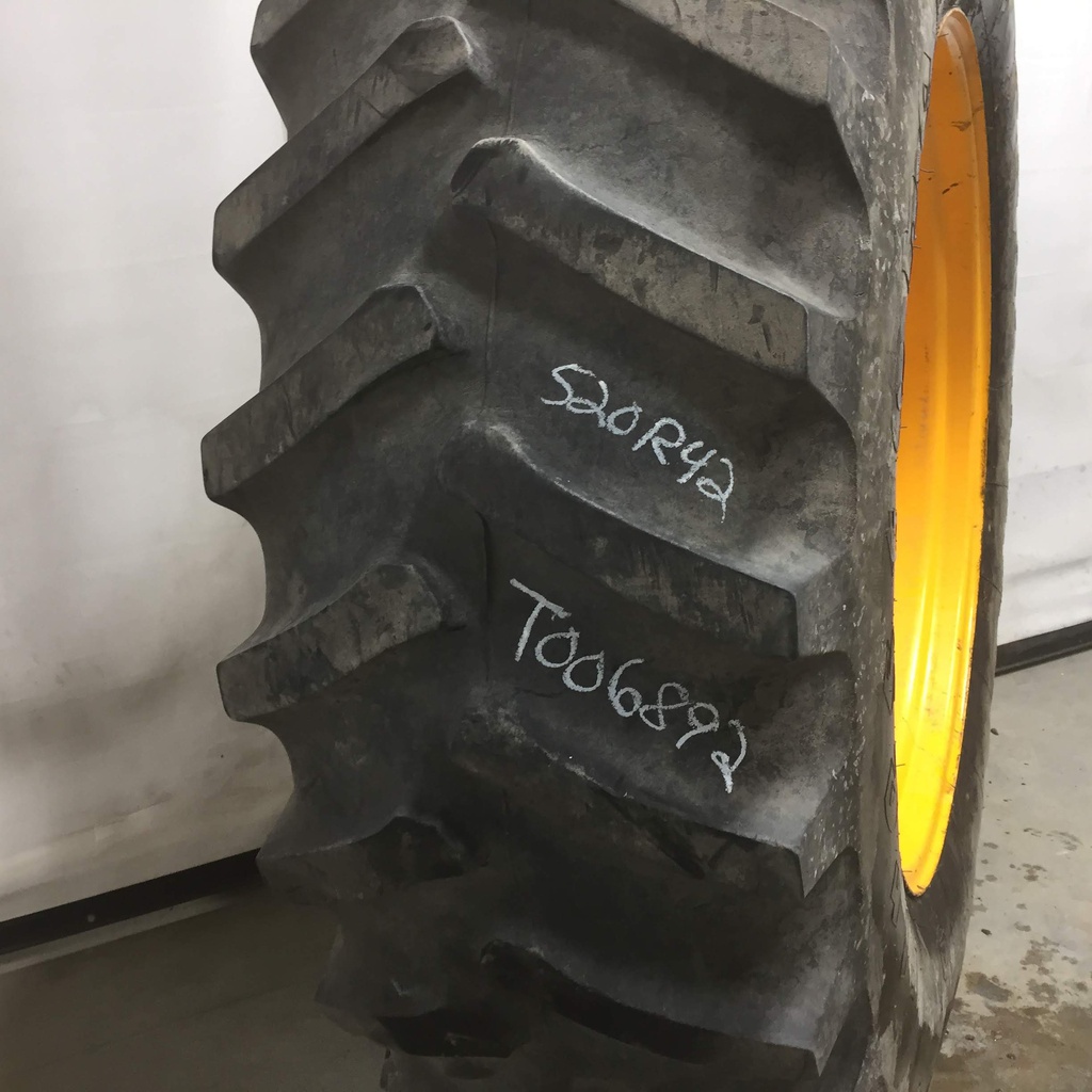 520/85R42 Firestone Radial All Traction 23 R-1 on Hagie Orange 10-Hole Formed Plate Sprayer 60%