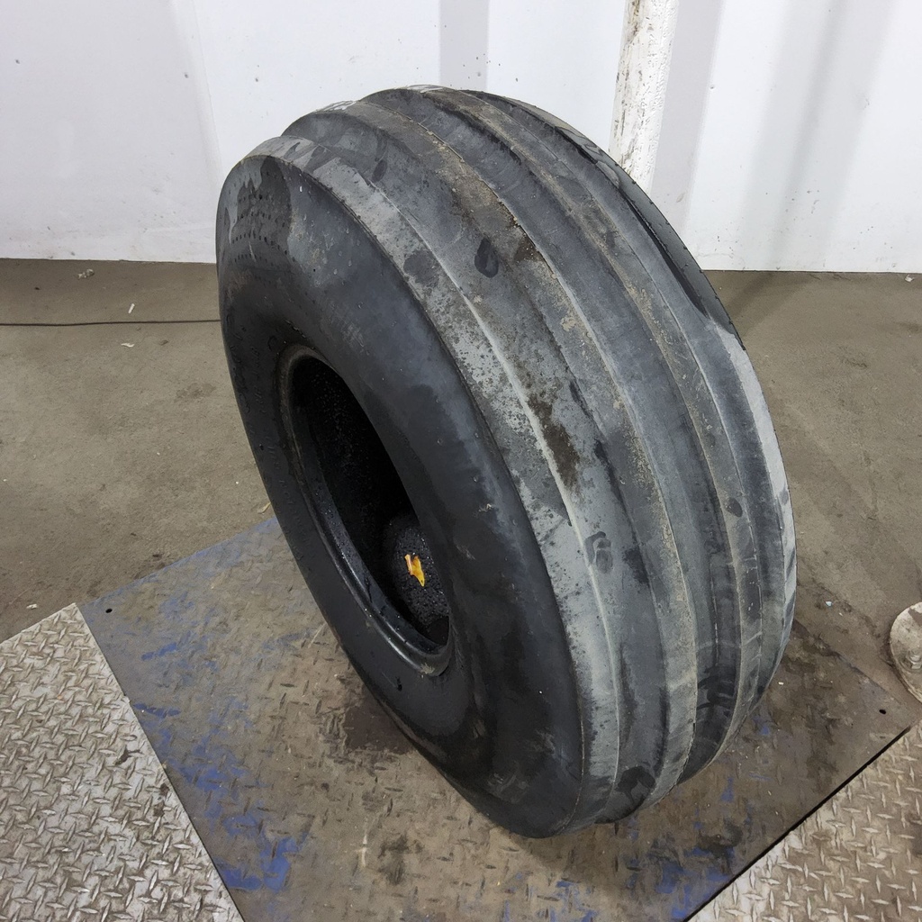 14L-16.1 Firestone Champion Guide Grip 4-Rib F-2M E (10 Ply), 85%