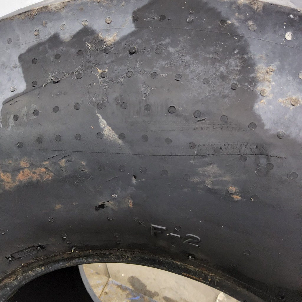 14L-16.1 Firestone Champion Guide Grip 4-Rib F-2M E (10 Ply), 85%