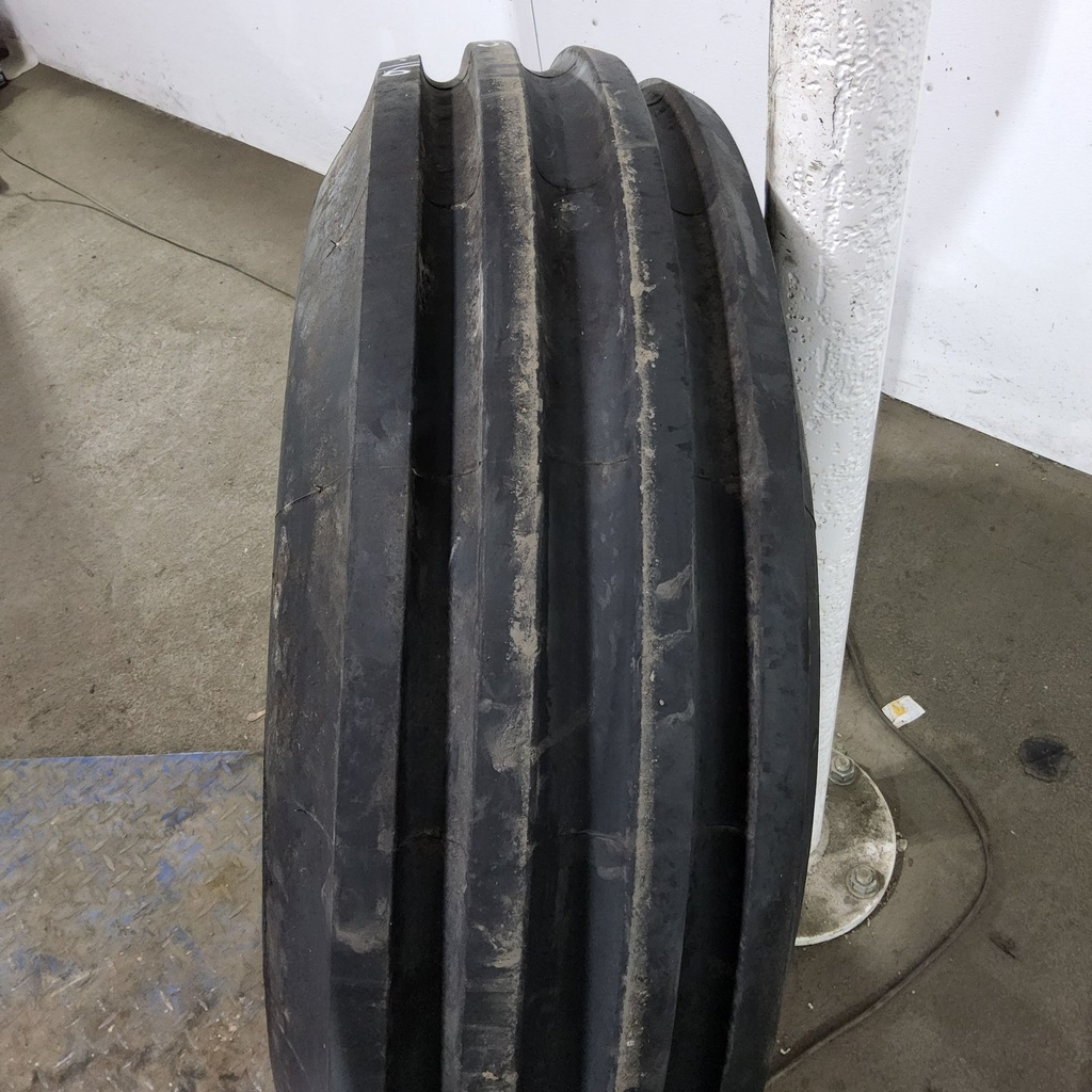 11.00-16SL Titan Farm Tru-Trac Multi-Rib 4-Rib F-2M F (12 Ply), 85%