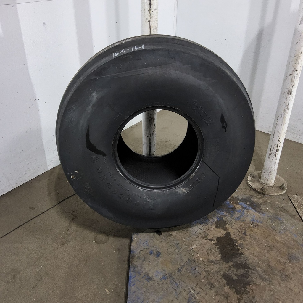 16.5L-16.1 Firestone Champion Guide Grip 4-Rib F-2M D (8 Ply), 90%