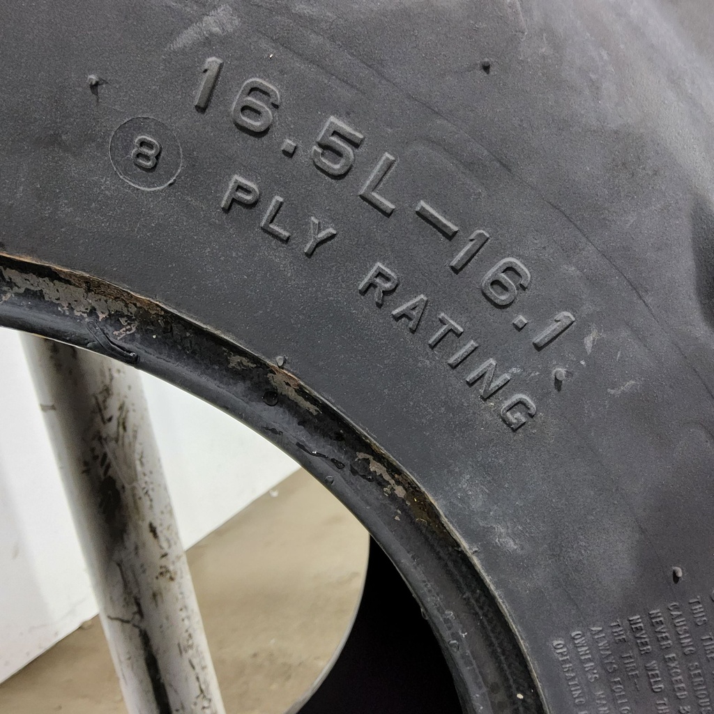 16.5L-16.1 Firestone Champion Guide Grip 4-Rib F-2M D (8 Ply), 90%