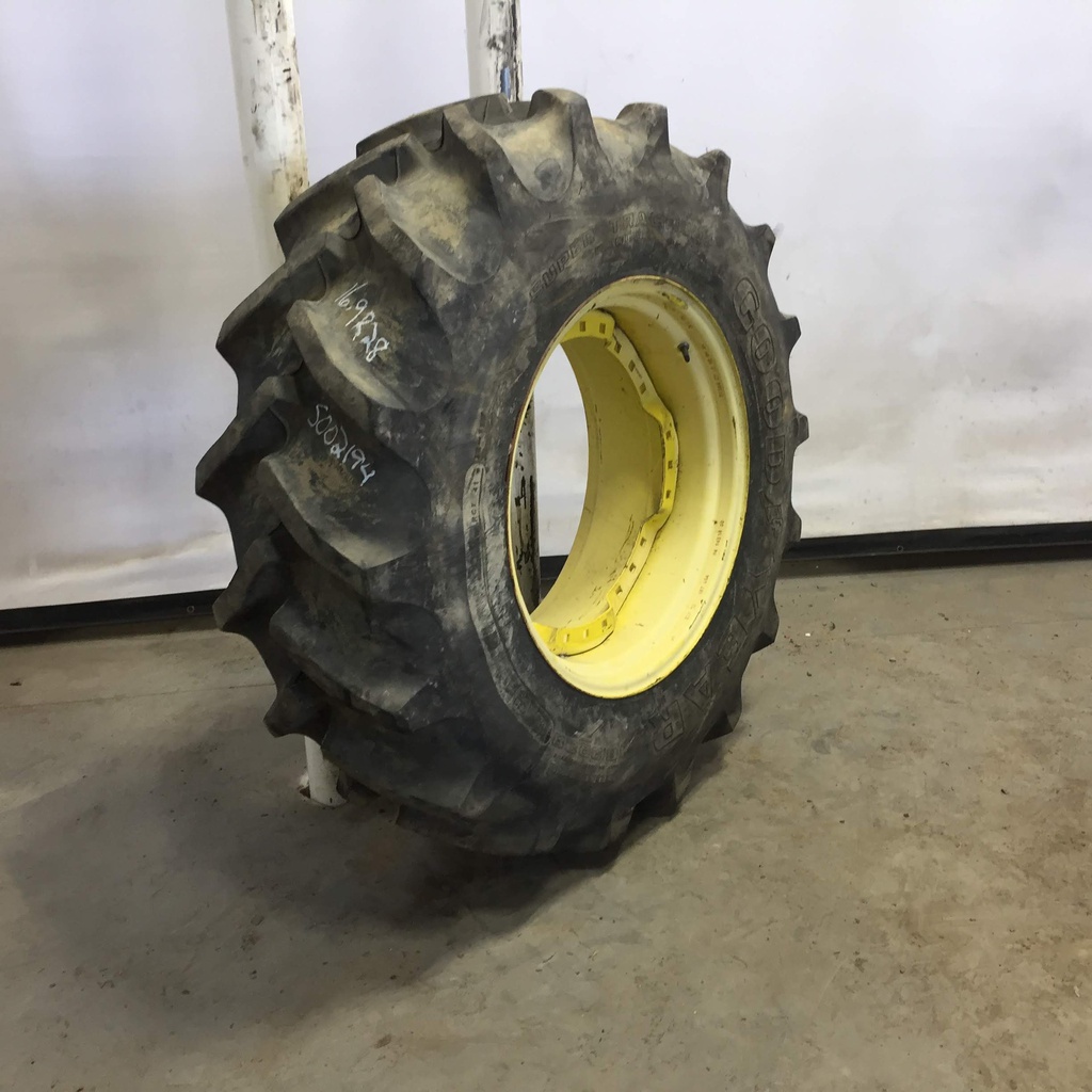 16.9/R28 Goodyear Farm Super Traction Radial R-1W on John Deere Yellow 12-Hole Waffle Wheel (Groups of 3 bolts) 85%