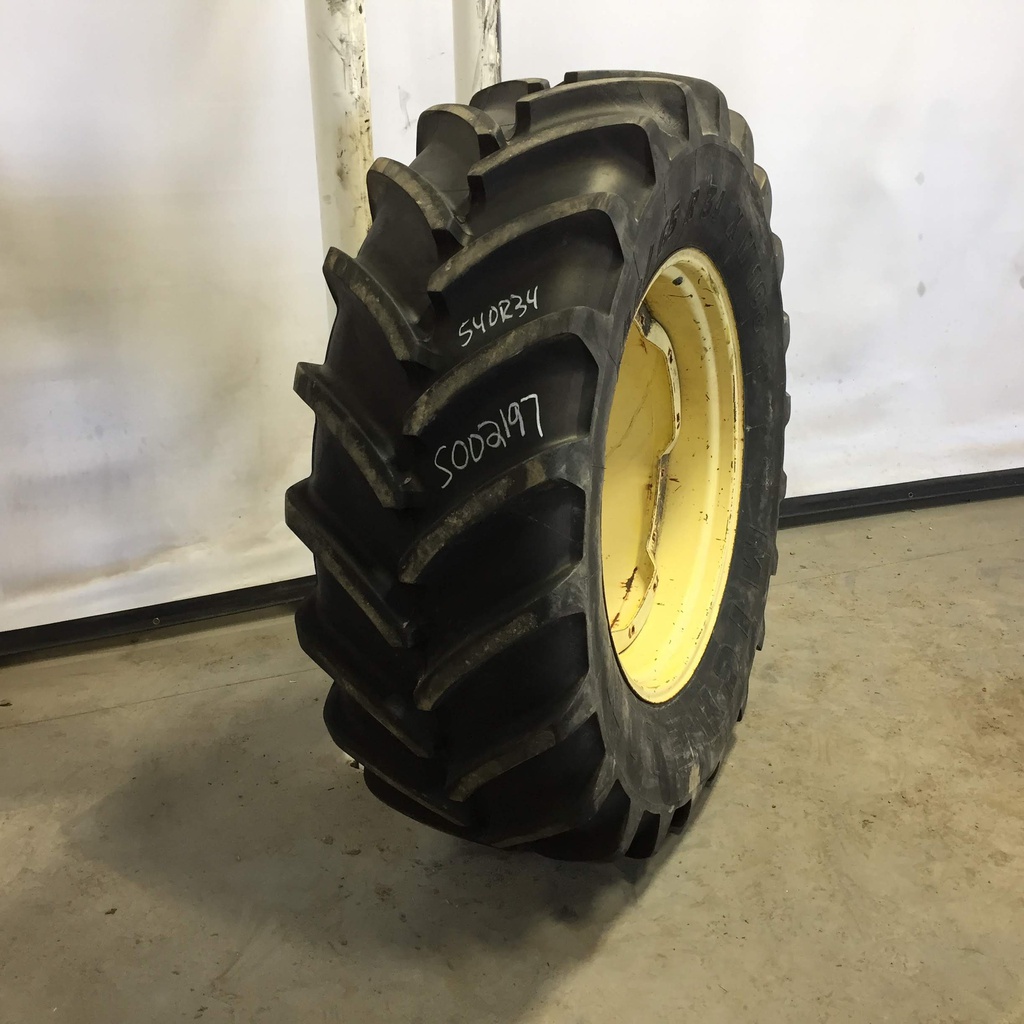 540/65R34 Michelin Multibib(XM108) R-1W on John Deere Yellow 8-Hole Waffle Wheel (Groups of 2 bolts) 80%
