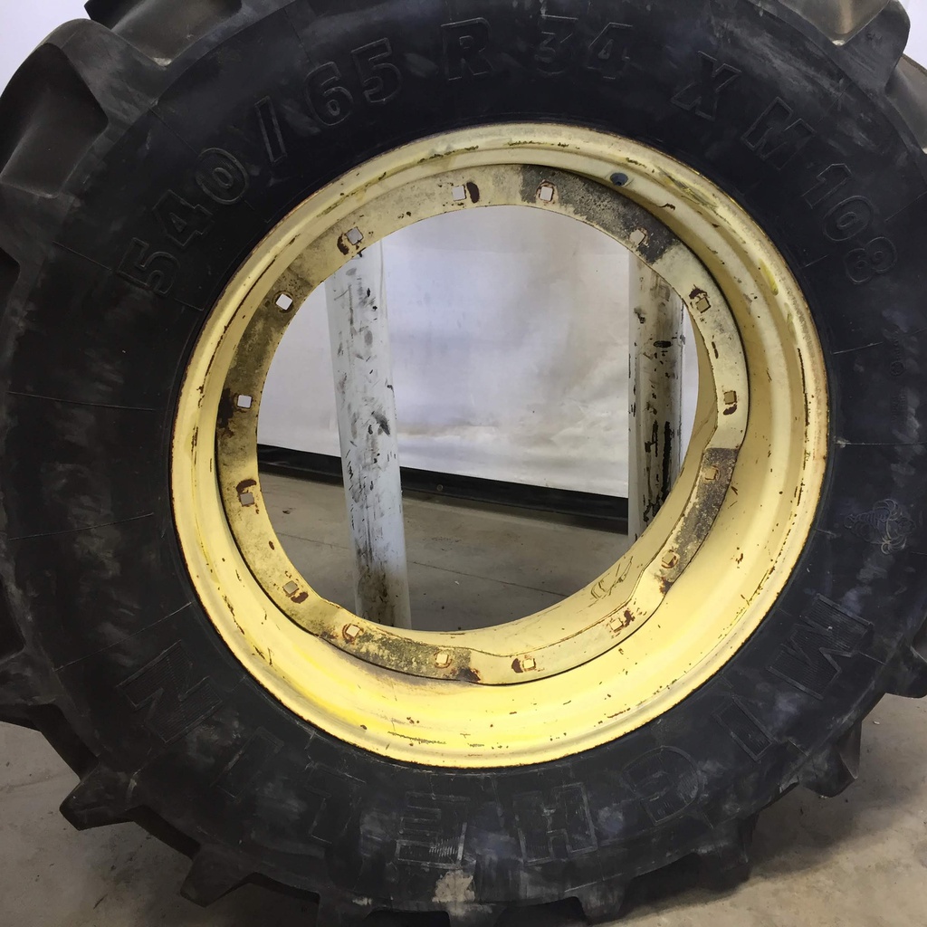 540/65R34 Michelin Multibib(XM108) R-1W on John Deere Yellow 8-Hole Waffle Wheel (Groups of 2 bolts) 80%