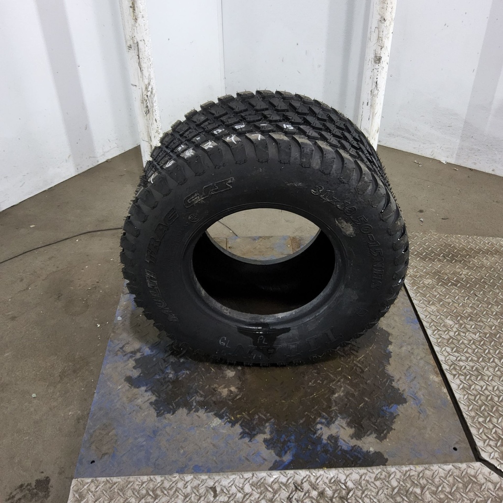 31x13.50-15NHS Titan Farm Multi Trac C/S HF-1 F (12 Ply), 99%