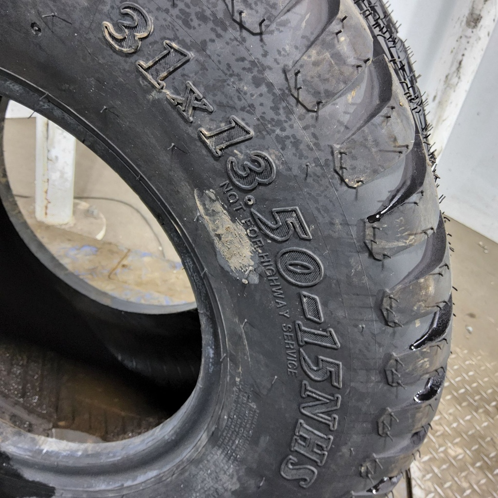 31x13.50-15NHS Titan Farm Multi Trac C/S HF-1 F (12 Ply), 99%