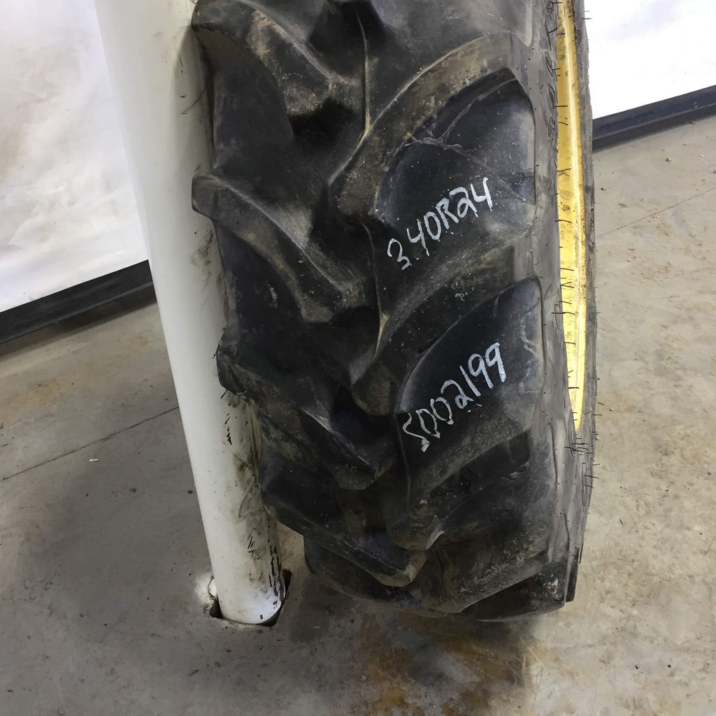 340/85R24 Firestone Radial All Traction DT R-1W on John Deere Yellow 8-Hole Rim with Clamp/U-Clamp (groups of 2 bolts) 95%