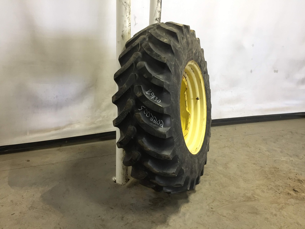 420/90R30 Firestone Radial All Traction FWD R-1 on John Deere Yellow 12-Hole Waffle Wheel (Groups of 3 bolts) 60%