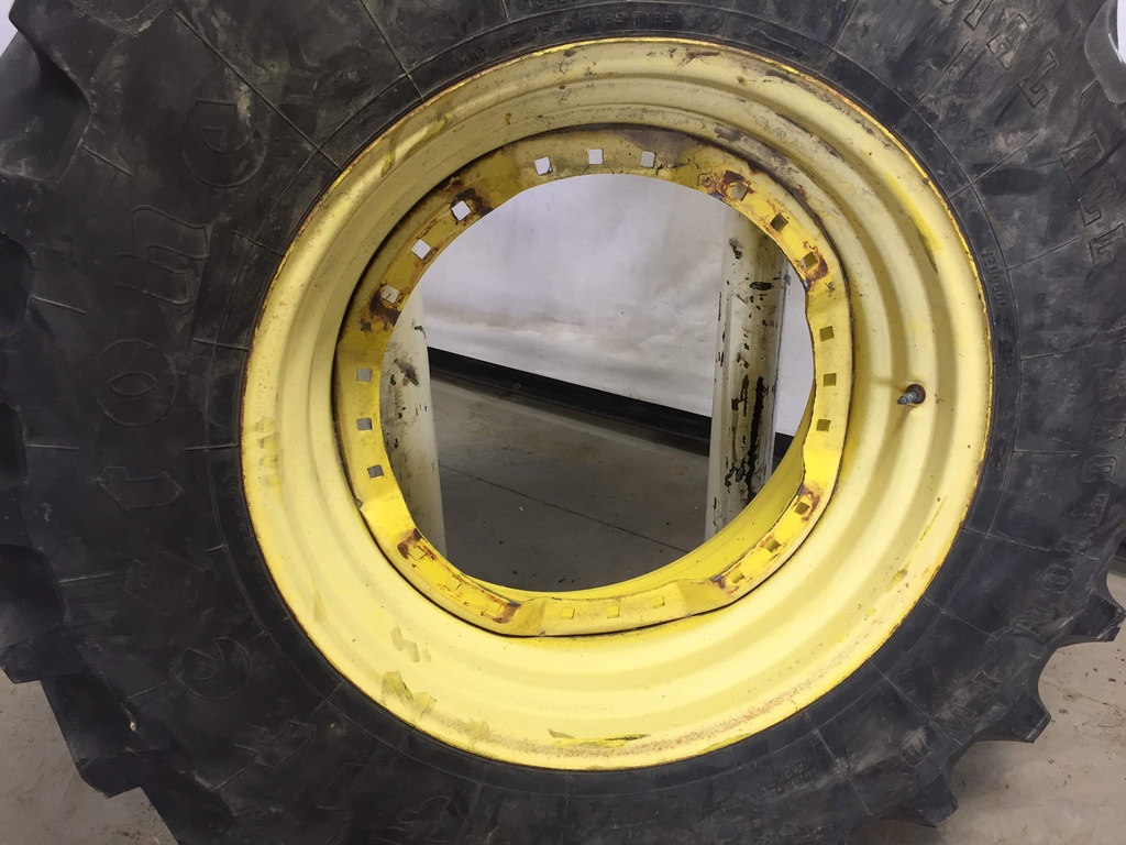 420/90R30 Firestone Radial All Traction FWD R-1 on John Deere Yellow 12-Hole Waffle Wheel (Groups of 3 bolts) 60%