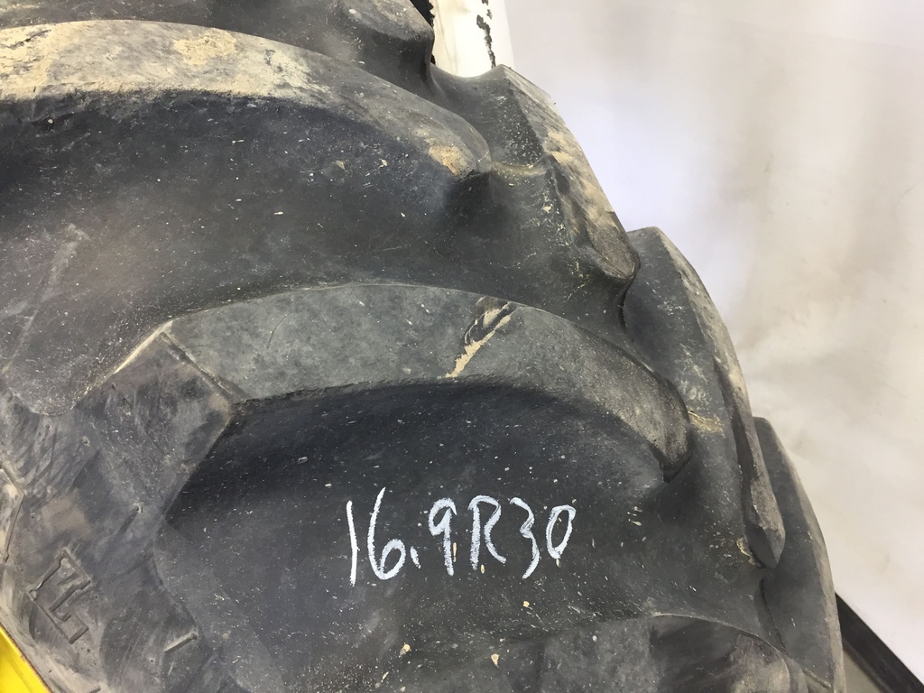420/90R30 Firestone Radial All Traction FWD R-1 on John Deere Yellow 12-Hole Waffle Wheel (Groups of 3 bolts) 60%