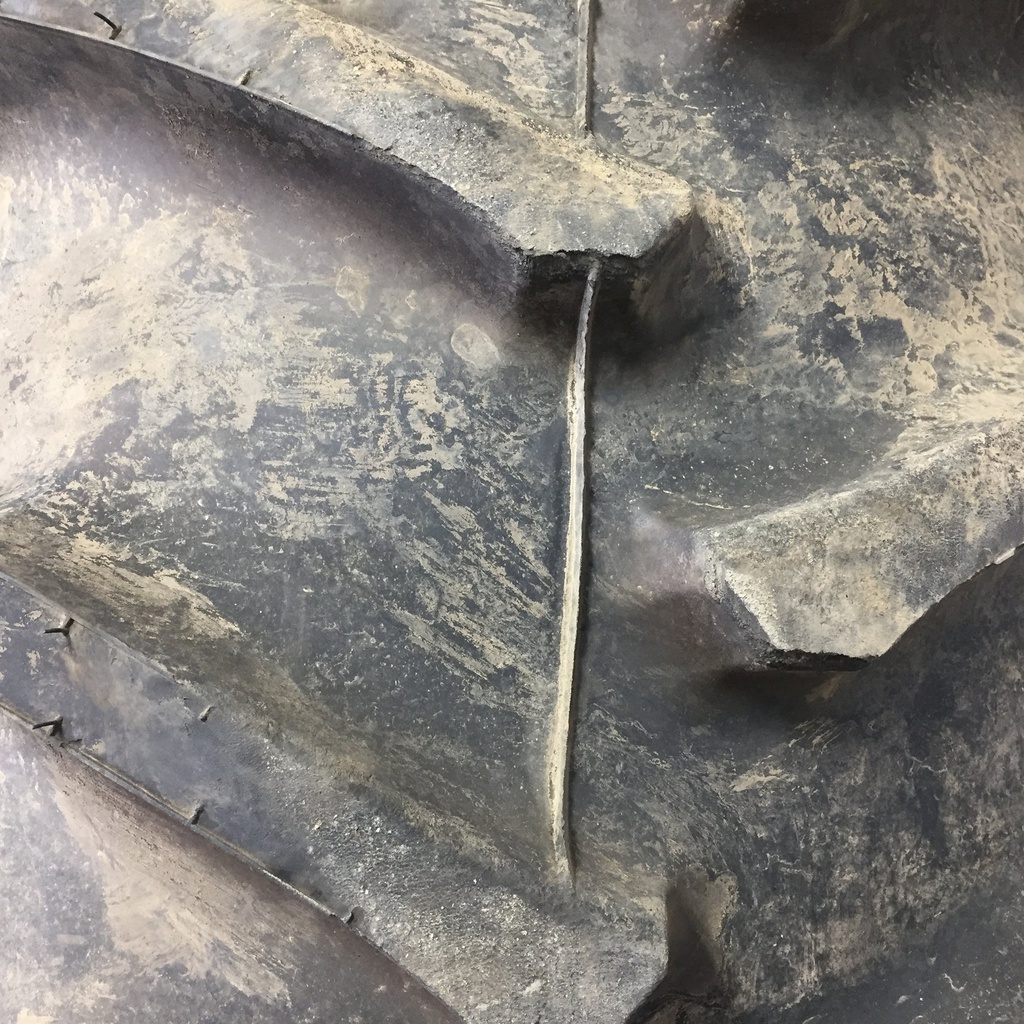 16.9/-30 Firestone Super All Traction II 23 R-1 on John Deere Yellow 8-Hole Rim with Clamp/U-Clamp (groups of 2 bolts) 95%