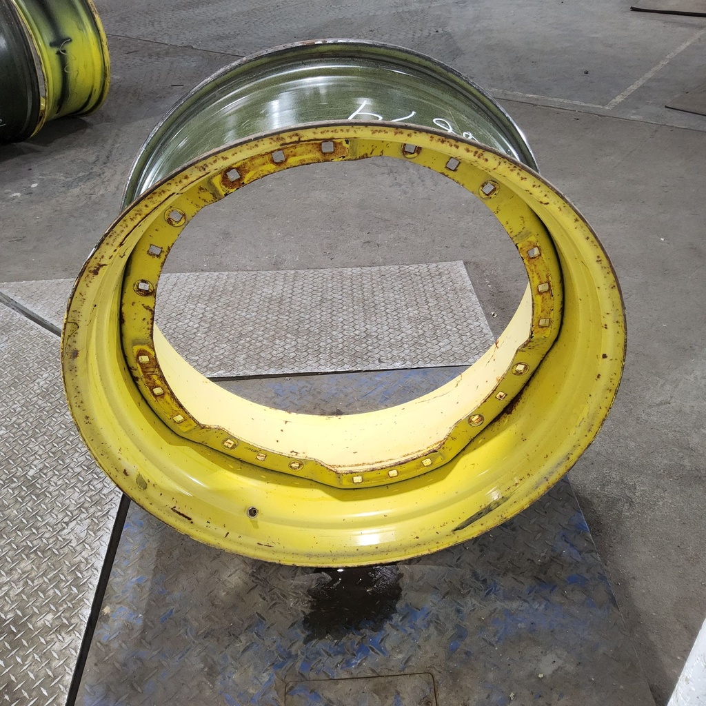 16"W x 34"D, John Deere Yellow 12-Hole Waffle Wheel (Groups of 3 bolts)