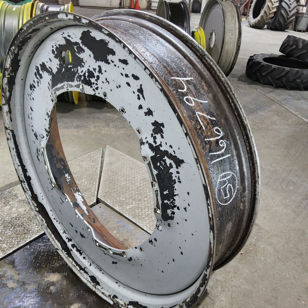 12"W x 54"D, Case IH Silver Mist 12-Hole Waffle Wheel (Groups of 3 bolts)
