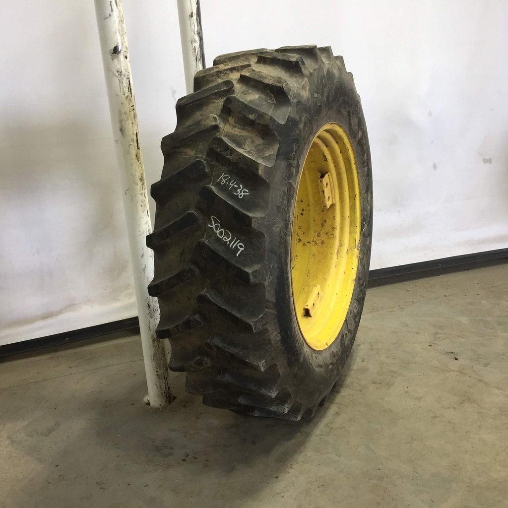 18.4/-38 Firestone Super All Traction II 23 R-1 on John Deere Yellow 8-Hole Rim with Clamp/U-Clamp (groups of 2 bolts) 75%