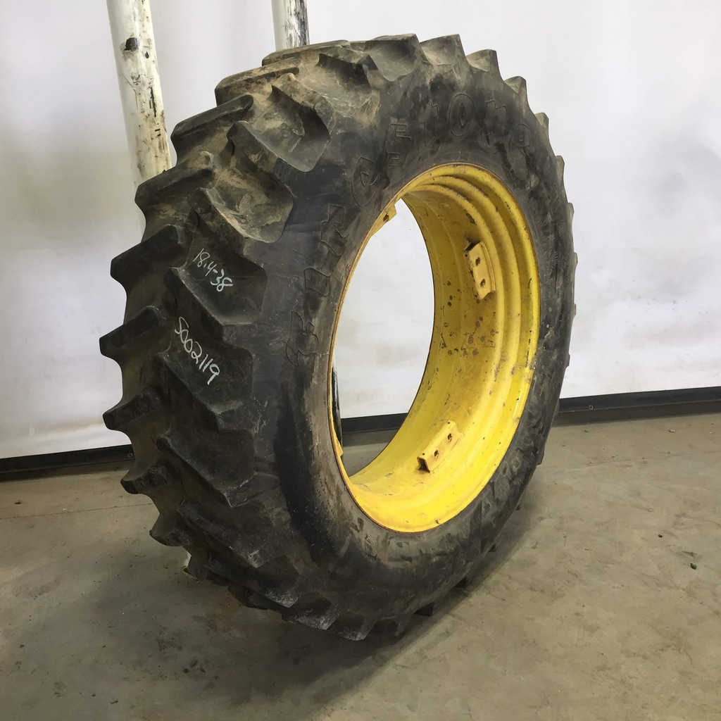 18.4/-38 Firestone Super All Traction II 23 R-1 on John Deere Yellow 8-Hole Rim with Clamp/U-Clamp (groups of 2 bolts) 75%