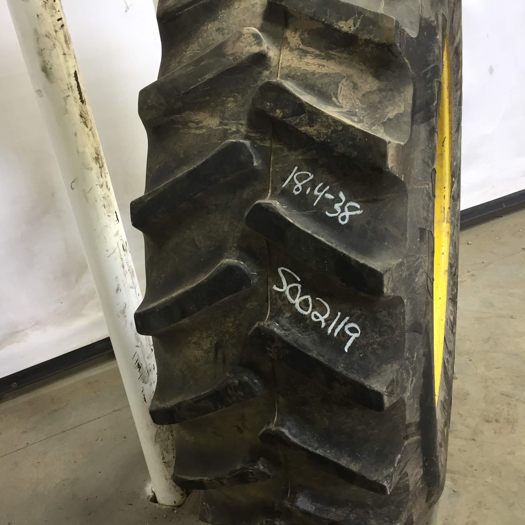 18.4/-38 Firestone Super All Traction II 23 R-1 on John Deere Yellow 8-Hole Rim with Clamp/U-Clamp (groups of 2 bolts) 75%