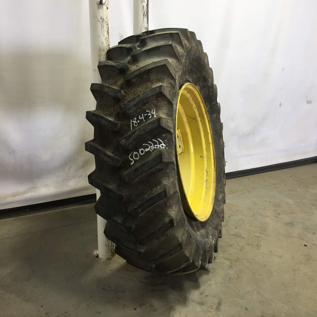 18.4/-34 Firestone Super All Traction 23 R-1 on John Deere Yellow 8-Hole Rim with Clamp/U-Clamp (groups of 2 bolts) 99%