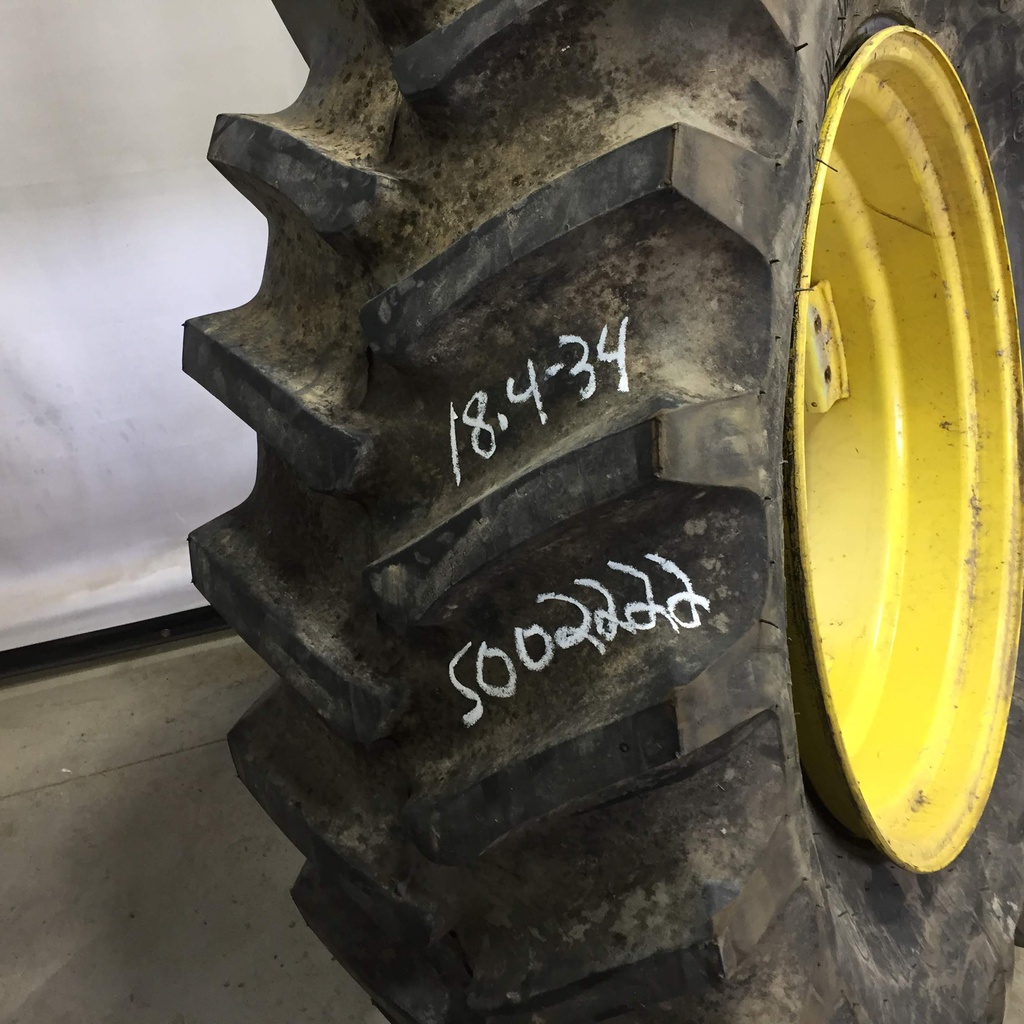 18.4/-34 Firestone Super All Traction 23 R-1 on John Deere Yellow 8-Hole Rim with Clamp/U-Clamp (groups of 2 bolts) 99%
