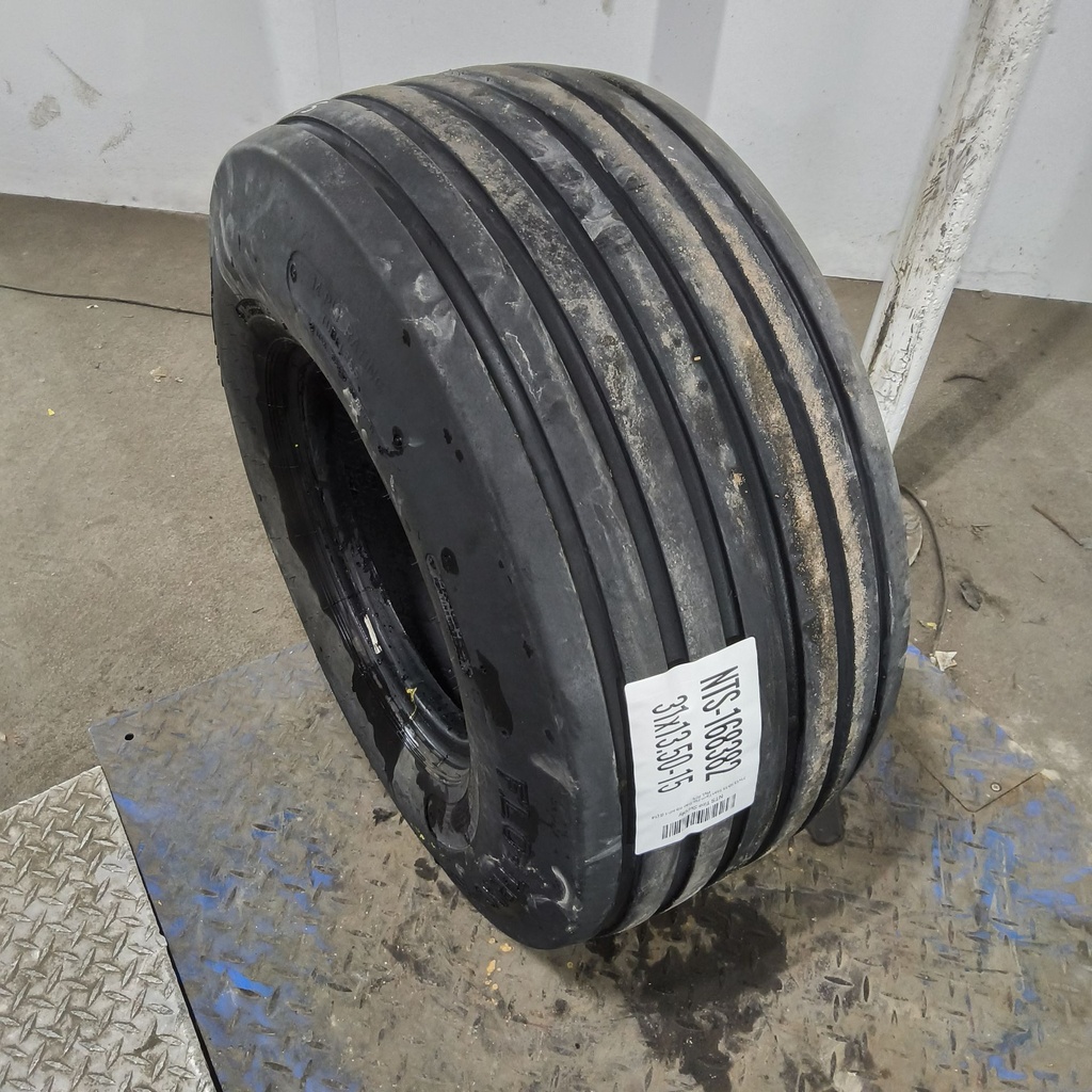 31x13.50-15 Titan Farm Flo-Trac Rib HF-1 G (14 Ply), 80%