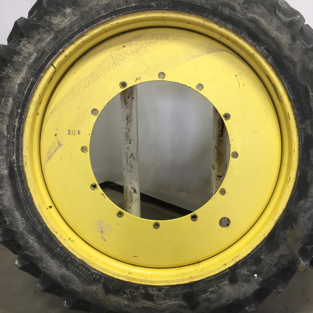 380/90R54 Firestone Radial 9000 R-1W on John Deere Yellow 12-Hole Stub Disc 60%