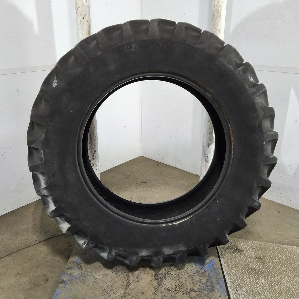 14.9R34 Firestone Radial All Traction FWD R-1 136A8 85%