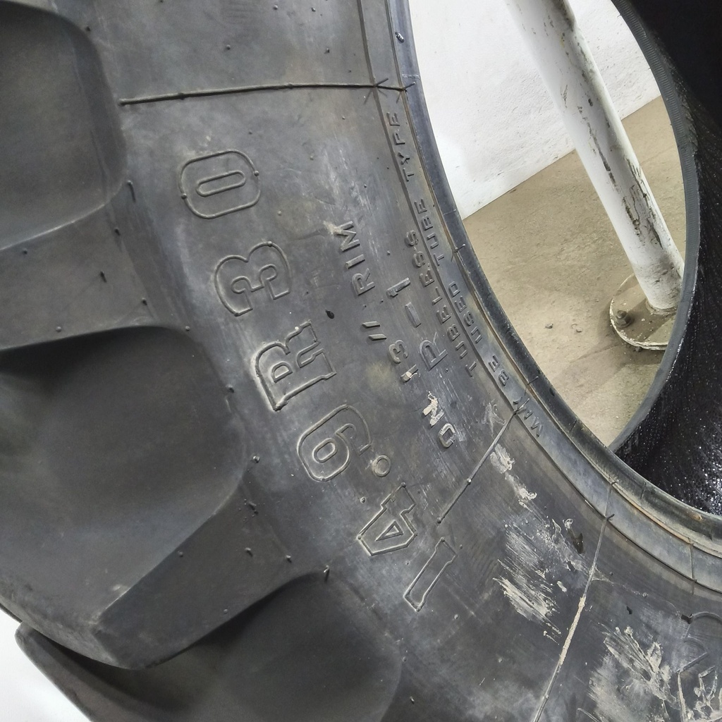14.9R30 Firestone Radial All Traction FWD R-1 134A8 90%