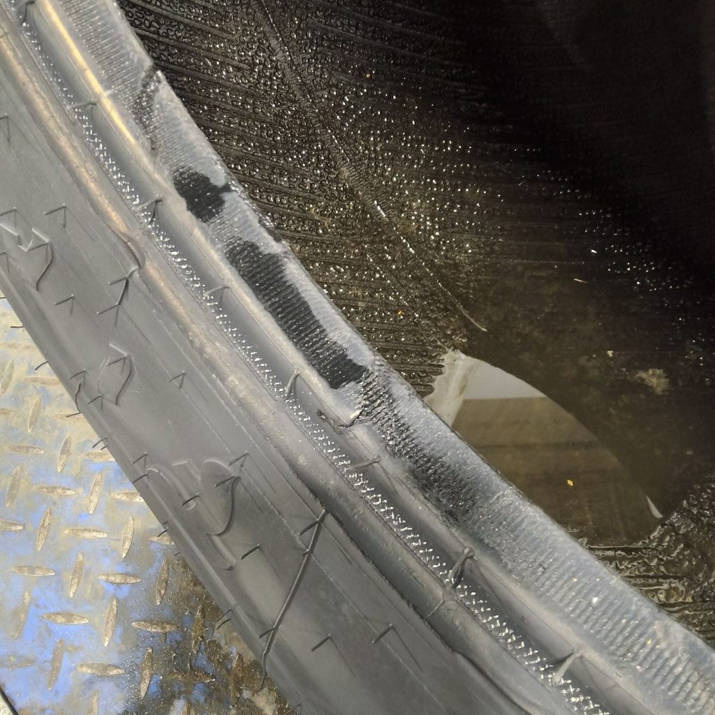 21L-24 Firestone All Traction Utility R-4 F (12 Ply), 99%