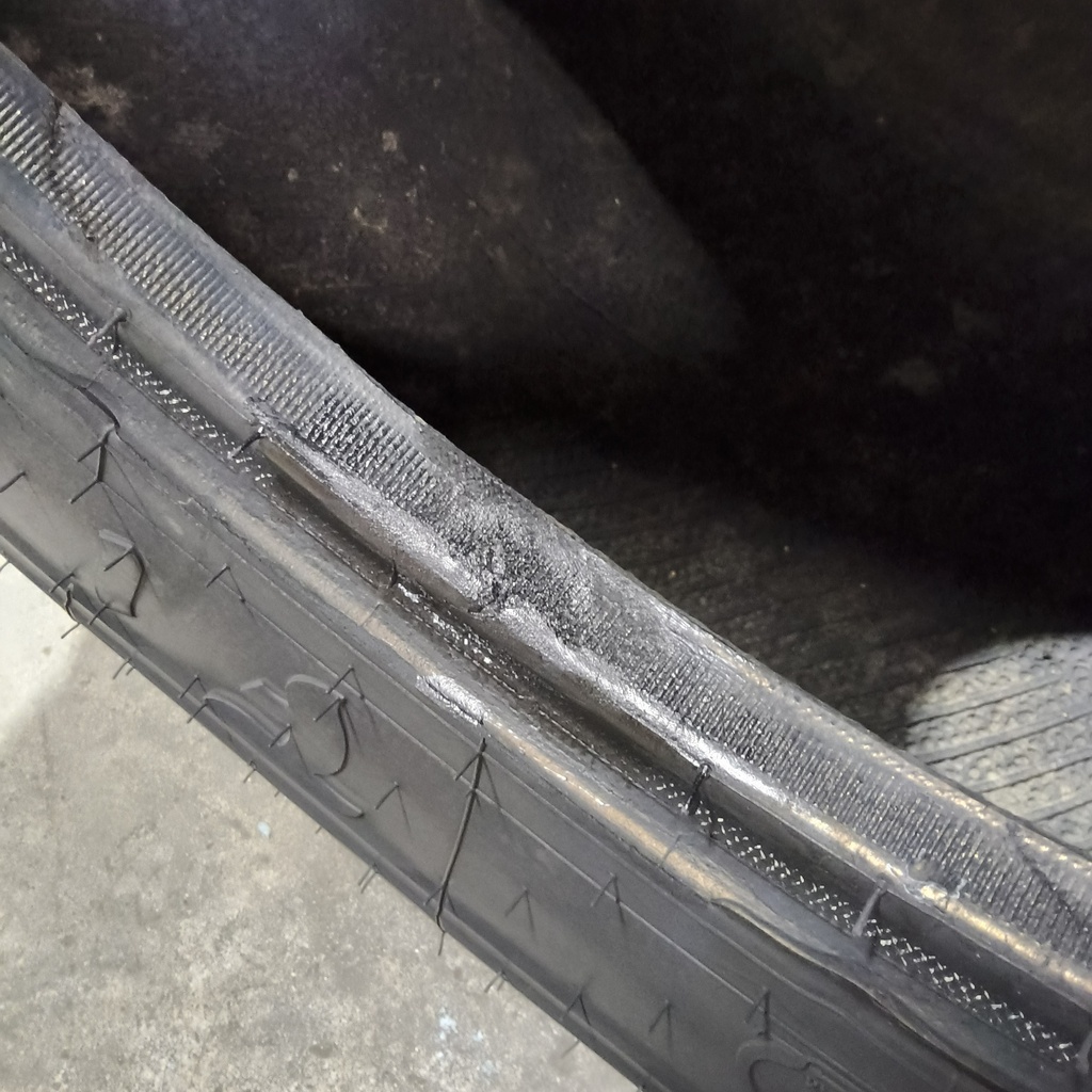 21L-24 Firestone All Traction Utility R-4 F (12 Ply), 99%