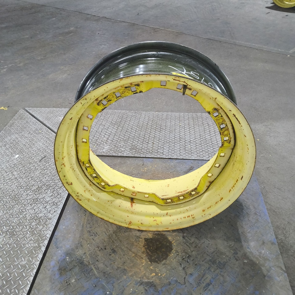 12"W x 28"D, John Deere Yellow 12-Hole Waffle Wheel (Groups of 3 bolts)