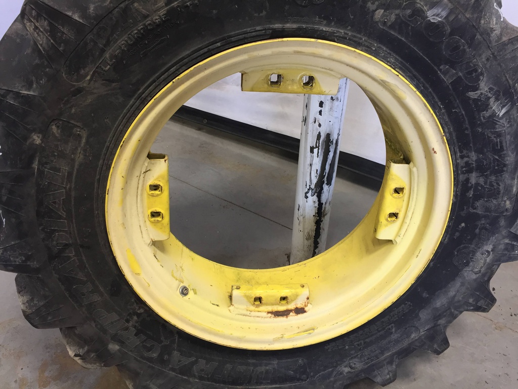 12.4/R24 Goodyear Farm Ultra Grip Radial R-1 on John Deere Yellow 8-Hole Rim with Clamp/U-Clamp (groups of 2 bolts) 90%