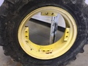 12.4/R24 Goodyear Farm Ultra Grip Radial R-1 on John Deere Yellow 8-Hole Rim with Clamp/U-Clamp (groups of 2 bolts) 90%