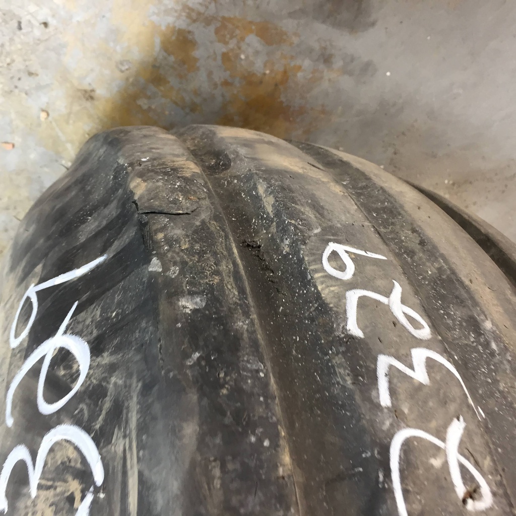 11.00/-16 Firestone Champion Guide Grip 4-Rib F-2M on John Deere Yellow 8-Hole Implement 35%